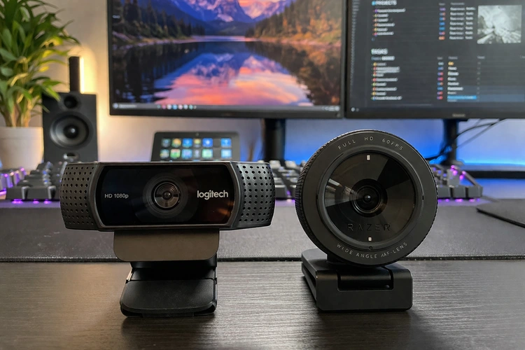 Logitech vs Razer webcam side by side comparison on a monitor
